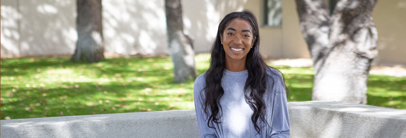 Genesis Benedith poses for the camera at Pima's Downtown Campus.