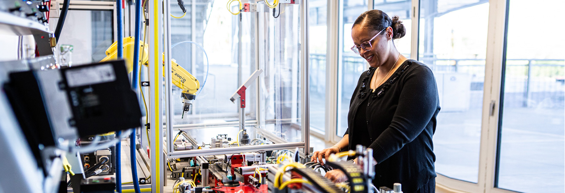 Ariane Davaul works in the Automated Industrial Tech lab at PCC.