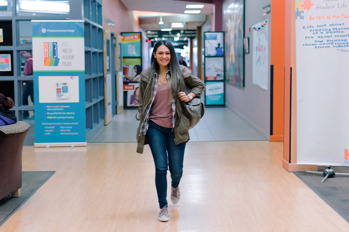 Student walking through campus.