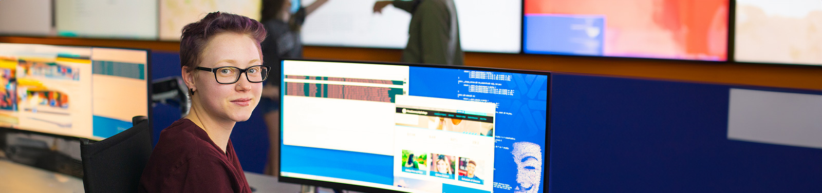 A student sits in Pima's Cybersecurity Center of Excellence