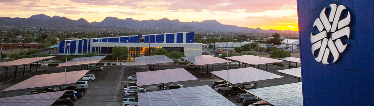 A sunset shot from Downtown campus over looking the parking lot