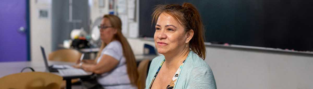 An adult learner studies at a Pima Adult Learning Center.