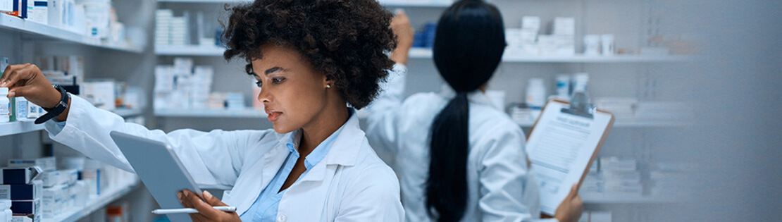 A pharmacy student working with pharmaceuticals